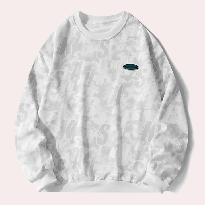 Witte oversized sweatshirt met subtiel camouflagepatroon en klein groen logo op de borst. Trendy streetwear, unisex, comfortabel en stijlvol.