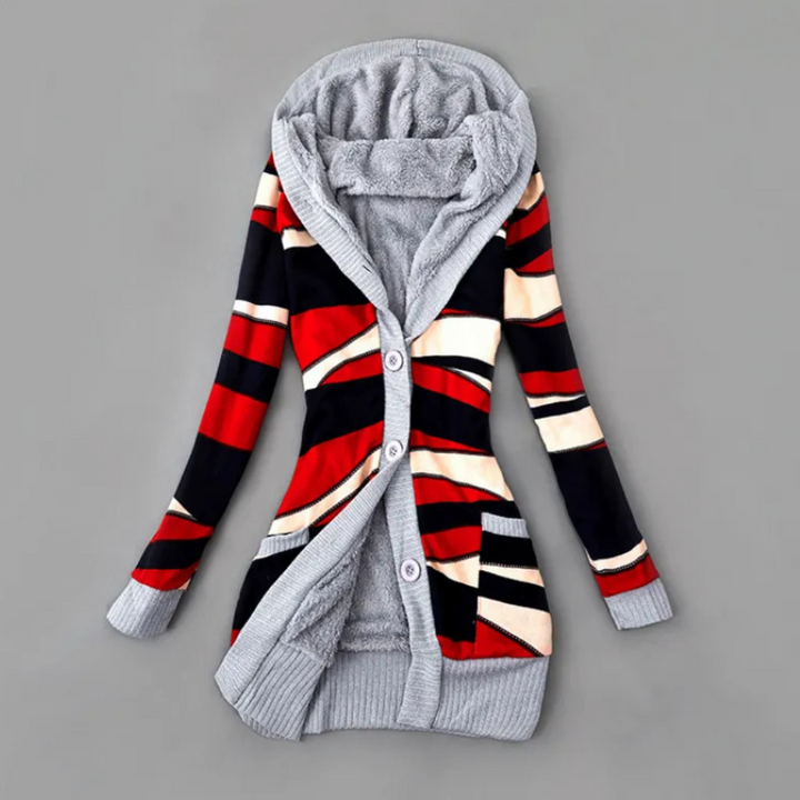 Stijlvolle damestrui met kleurrijk geometrisch patroon, lange mouwen en knopen. Perfect voor herfstmode en casual outfits.