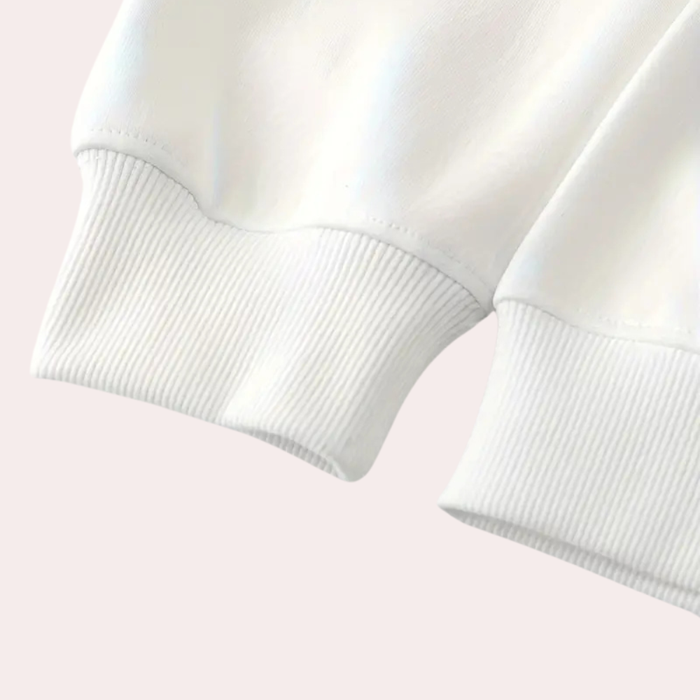 Witte katoenen trui met geribbelde boorden, minimalistisch design, comfortabele pasvorm, ideaal voor casual mode en dagelijkse outfits.