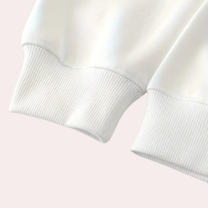 Witte katoenen trui met geribbelde boorden, minimalistisch design, comfortabele pasvorm, ideaal voor casual mode en dagelijkse outfits.