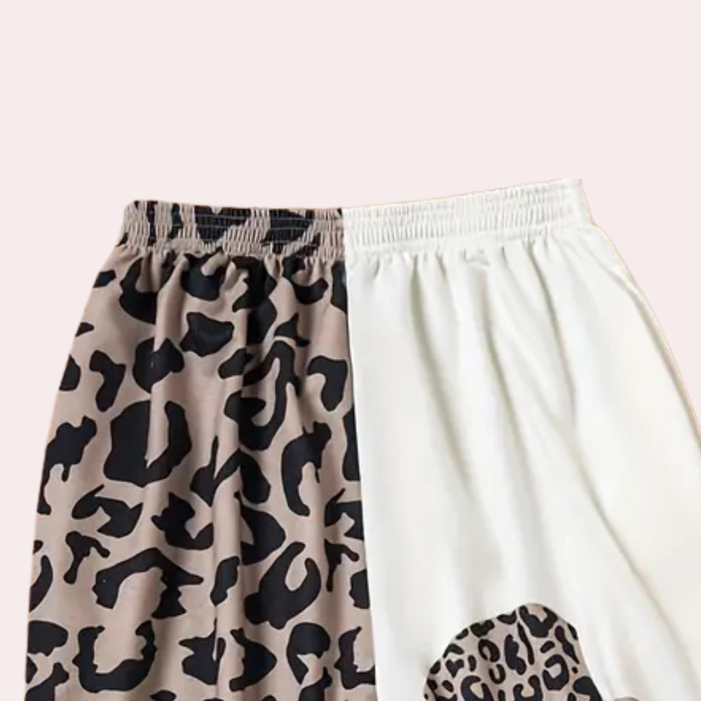Tweekleurige rok met luipaardprint, elastische tailleband, trendy design, damesmode, casual stijl, comfortabele pasvorm, modieuze kleding.