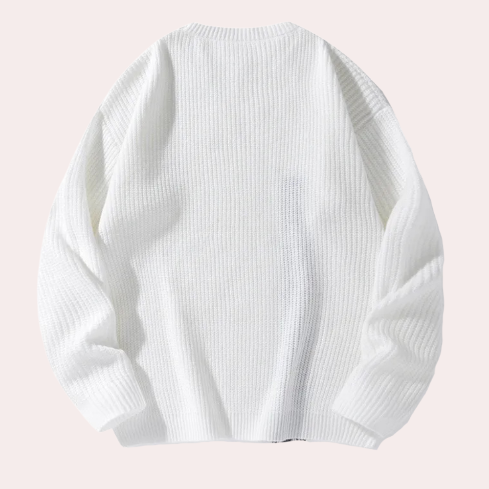 Witte gebreide trui, oversized pasvorm, lange mouwen, geribbelde textuur, uniseks mode, comfortabele winterkleding, minimalistisch ontwerp.