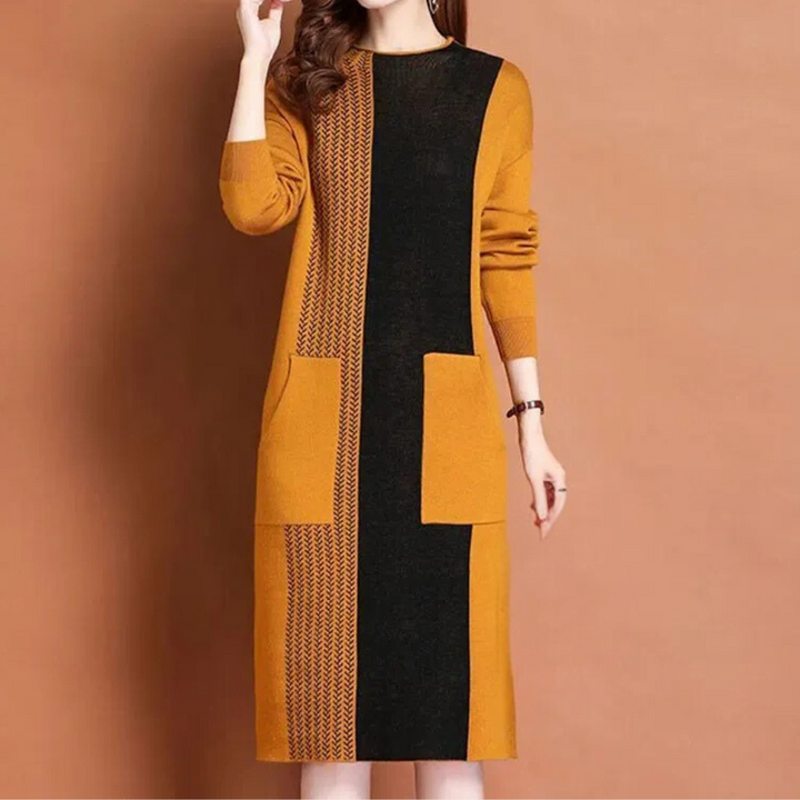 Oranje en zwart gebreide jurk met lange mouwen en zakken, damesmode herfst-winter, elegant design, comfortabele pasvorm, trendy kledingstijl.