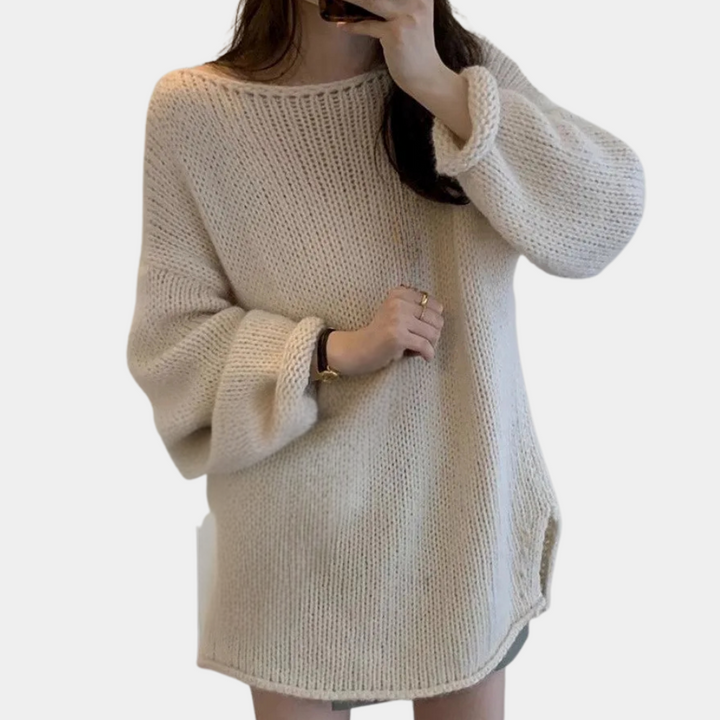 Beige oversized gebreide trui voor dames, casual en comfortabel, ideaal voor herfst- en wintermode. Perfect voor een stijlvolle, warme look.
