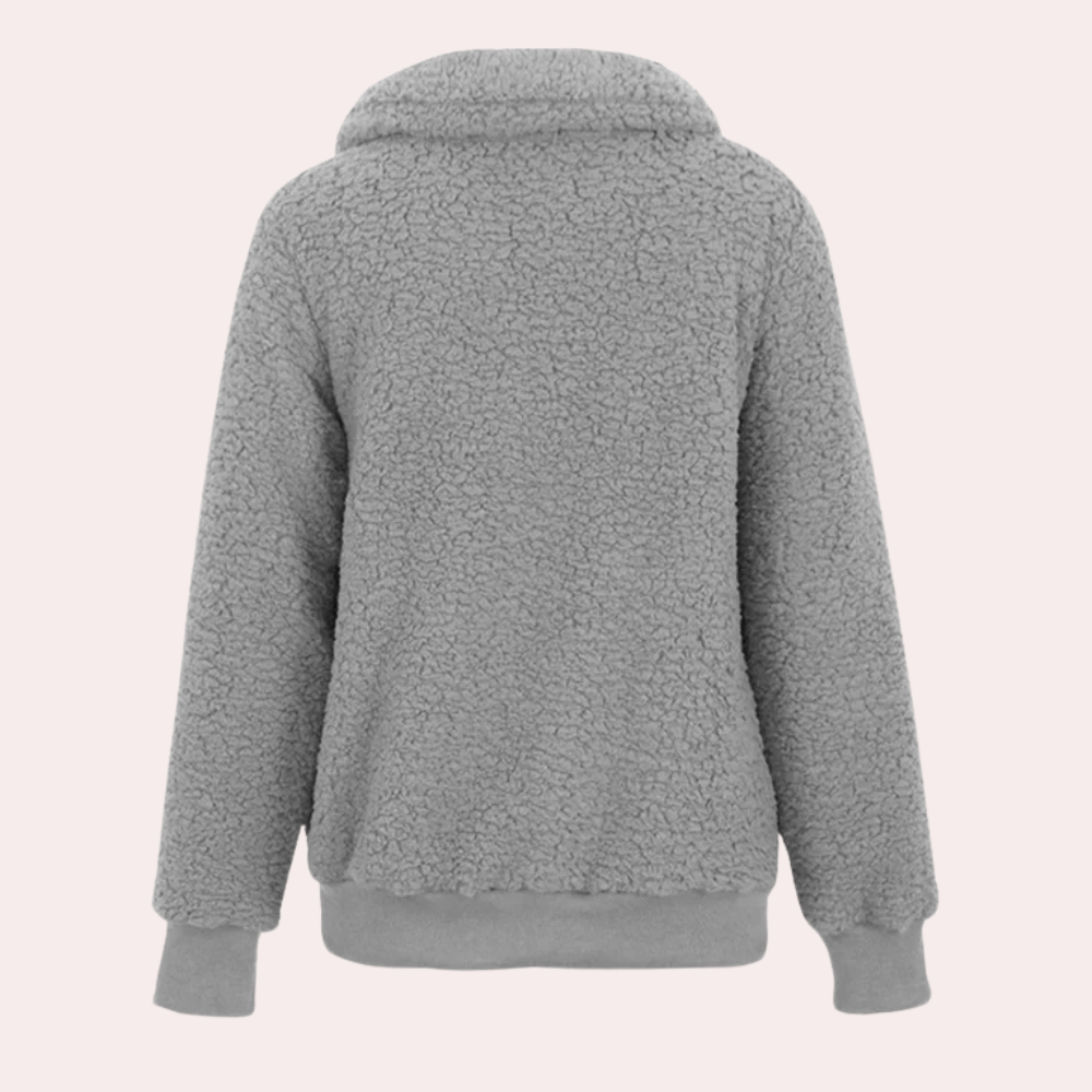Grijze fleece trui met capuchon, achterkant. Zachte, warme stof, ideaal voor wintermode. Comfortabele pasvorm, trendy en functioneel design.
