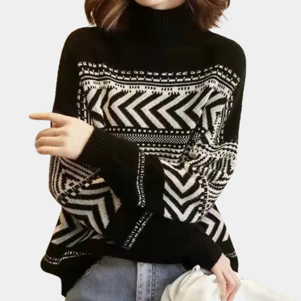 Zwart-witte damestrui met geometrisch zigzagpatroon, coltrui, lange mouwen, casual wintermode, warme gebreide kleding.