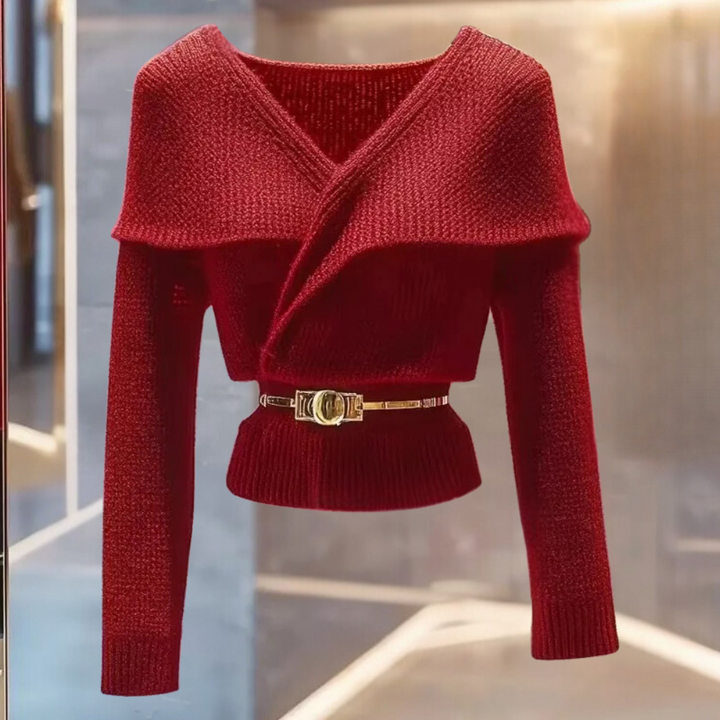 Rode gebreide damestrui met V-hals en lange mouwen, voorzien van een stijlvolle riem. Perfect voor herfstmode en winteroutfits.