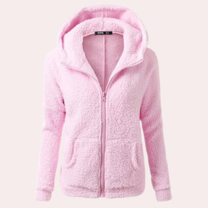 Roze fleece damesvest met capuchon, ritssluiting en zakken. Comfortabel en warm, ideaal voor casual outfits en herfstmode.