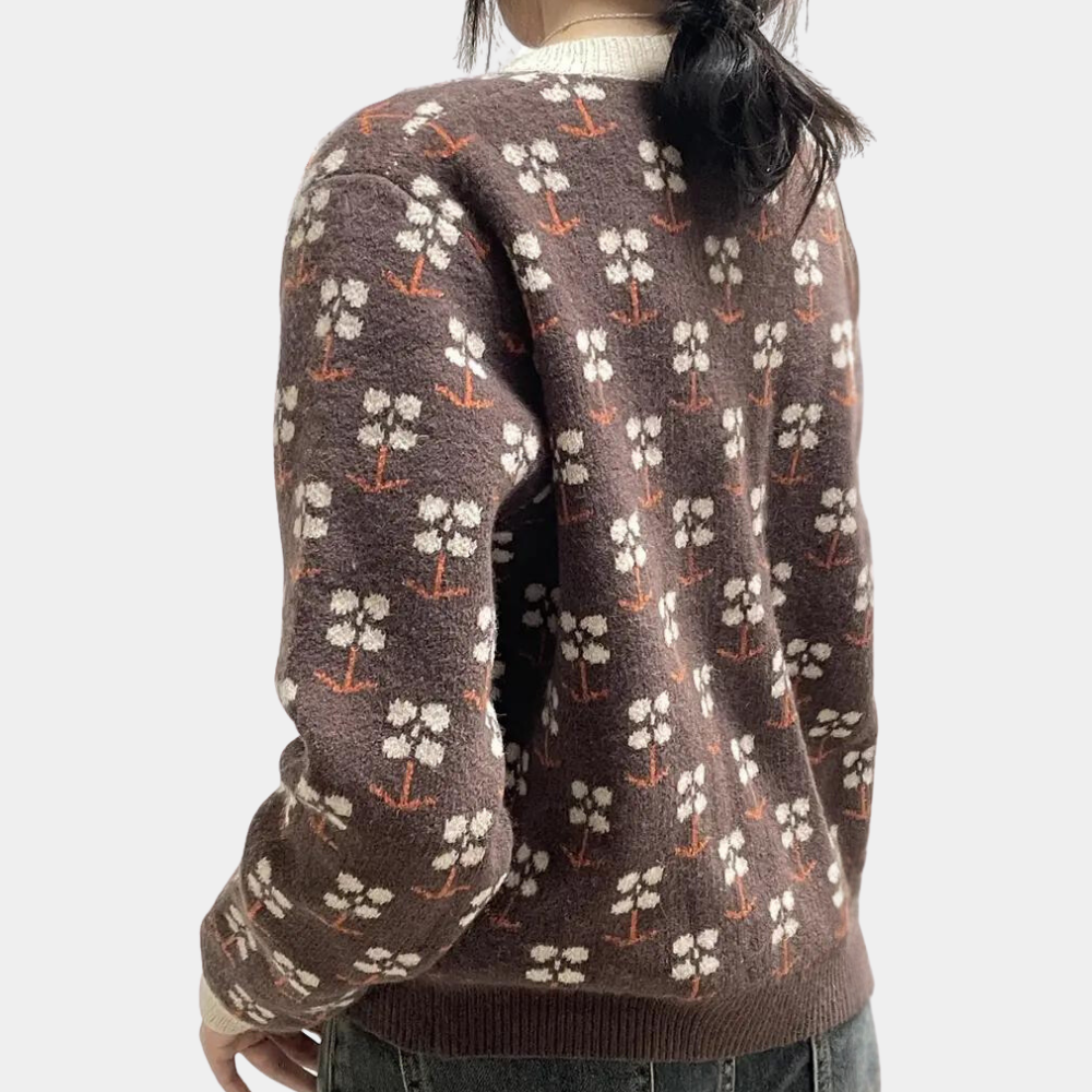 Bruine trui met bloemenpatroon, damesmode, herfstkleding, gebreide stof, casual stijl, trendy design, comfortabele pasvorm, modieuze outfit.