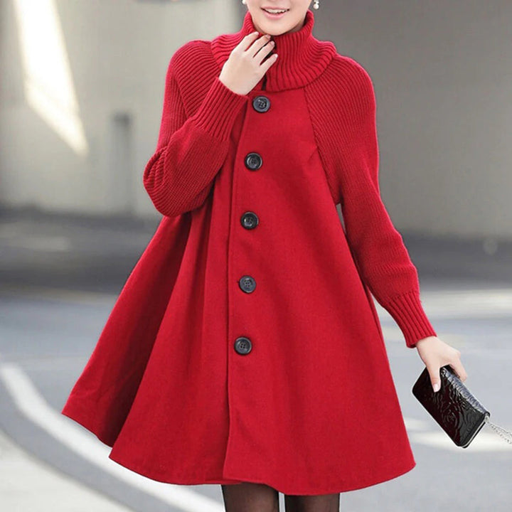 Rode dames winterjas met knopen, hoge kraag en lange mouwen. Stijlvolle en warme jas voor koude seizoenen. Perfect voor modieuze winteroutfits.