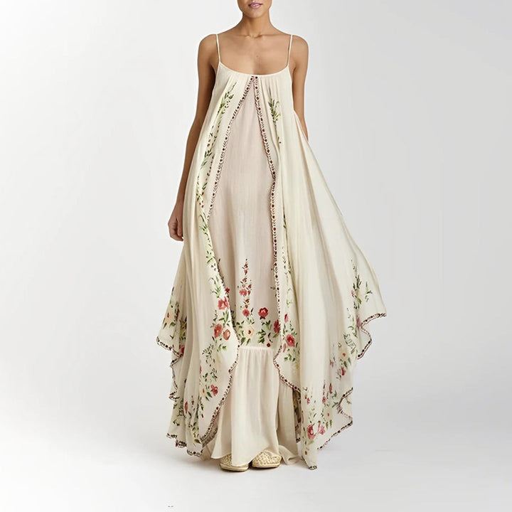 Beige maxi-jurk met bloemenprint, mouwloos en vloeiend ontwerp, ideaal voor zomermode. Elegante dameskleding, bohemian stijl.
