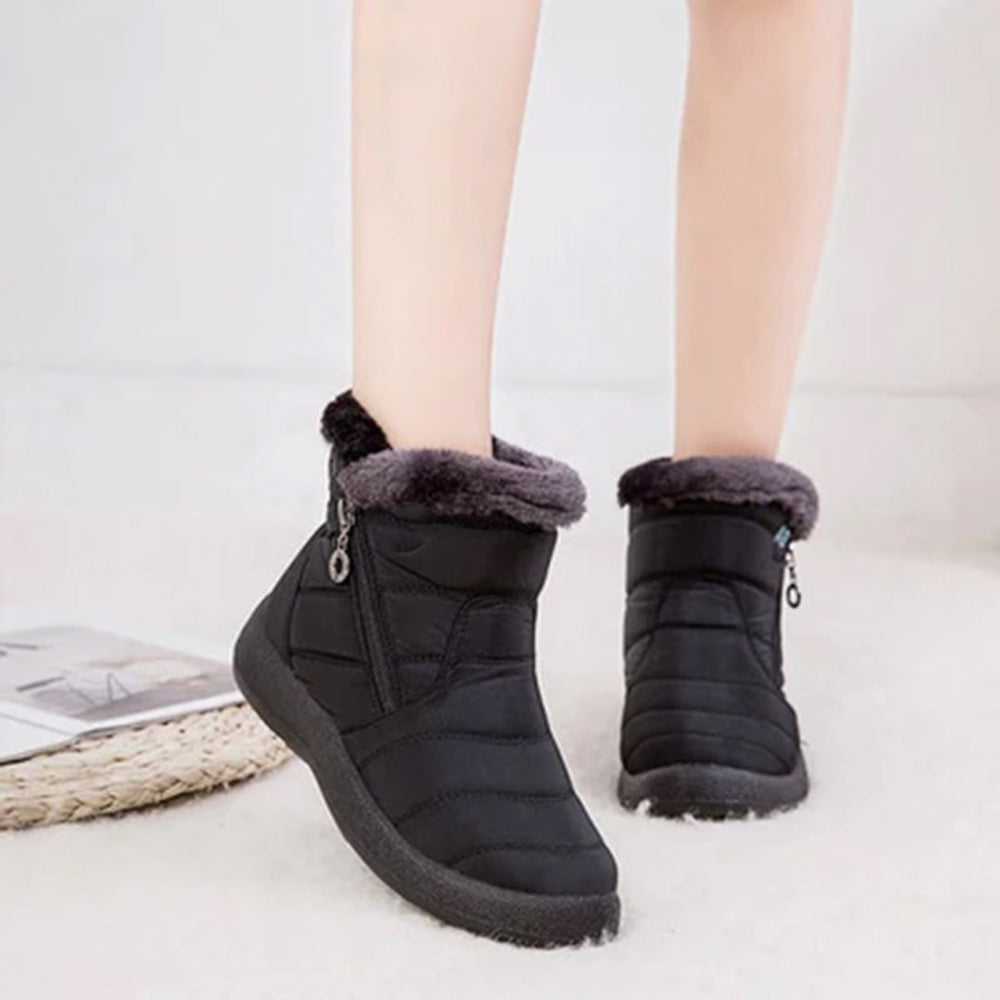 Zwarte winterlaarzen met bontvoering voor dames, waterdicht en warm, ideaal voor koude weersomstandigheden. Comfortabele en stijlvolle schoenen.