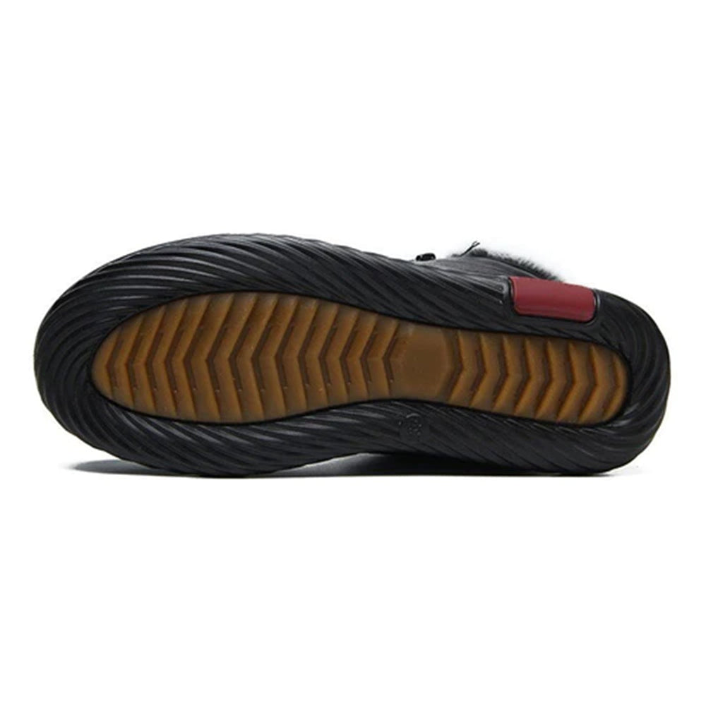Zwarte rubberen schoenzool met antislipprofiel en bruine loopvlak, ideaal voor grip en duurzaamheid. Perfect voor dagelijks gebruik en sportactiviteiten.