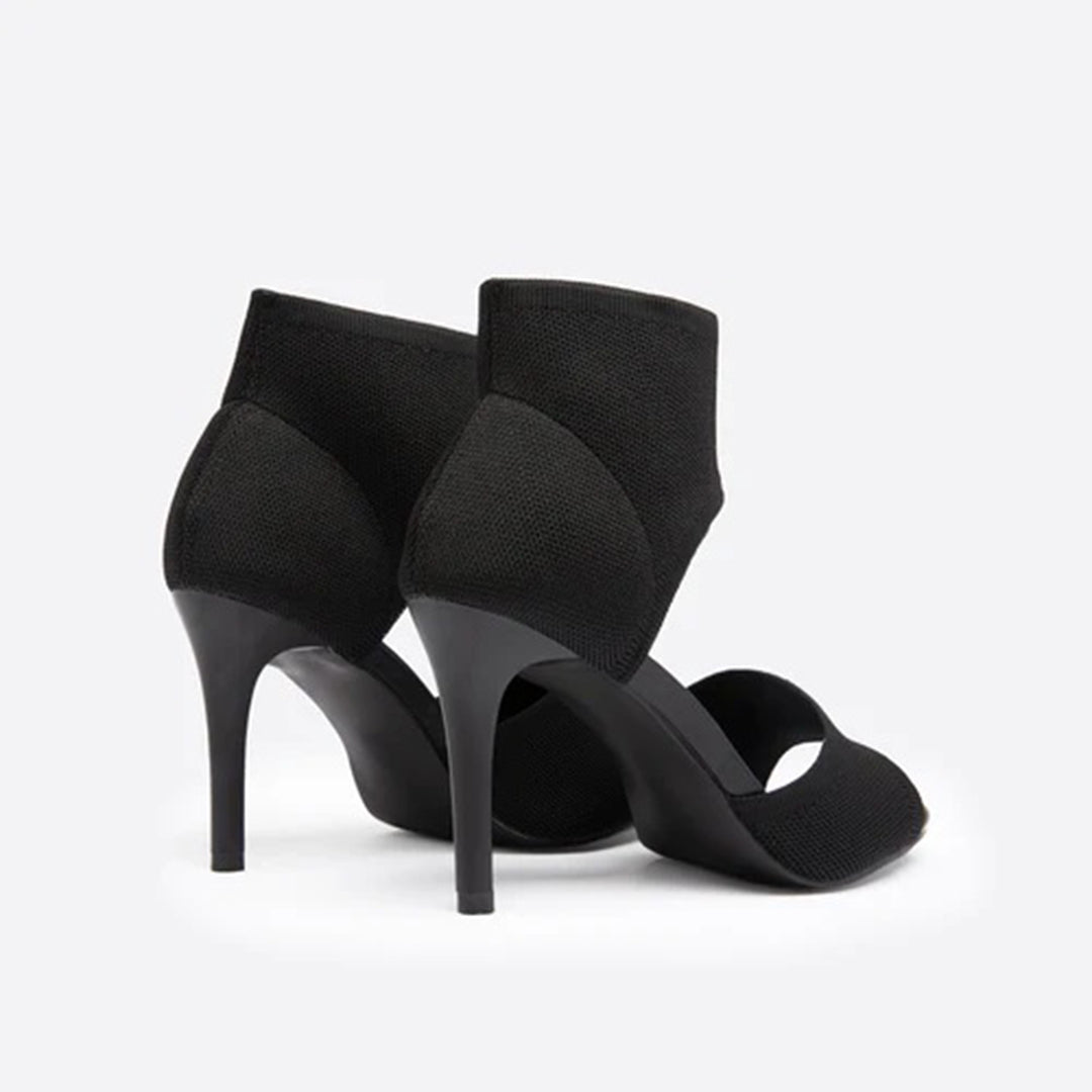 Zwarte dameshakken met open teen en hoge naaldhak, elegant design, perfect voor avondkleding en formele gelegenheden. Stijlvolle zwarte schoenen.
