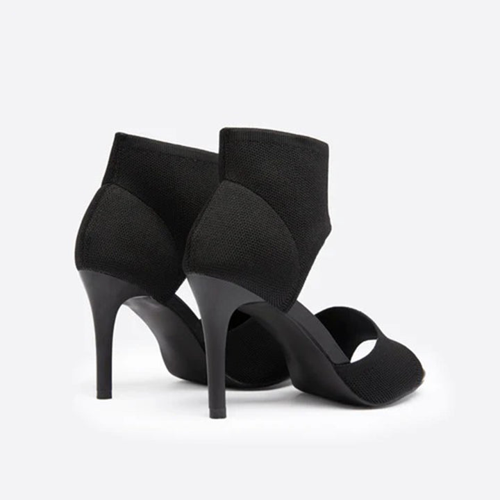 Zwarte dameshakken met open teen en hoge naaldhak, elegant design, perfect voor avondkleding en formele gelegenheden. Stijlvolle zwarte schoenen.