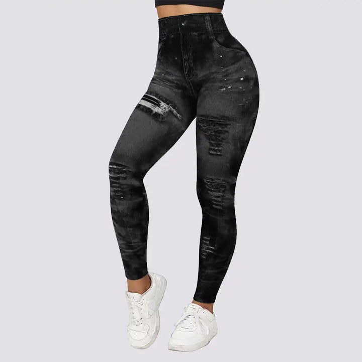 Zwarte ripped skinny jeans voor dames, hoge taille, modieuze streetwear, comfortabele pasvorm, ideaal voor casual en trendy outfits.