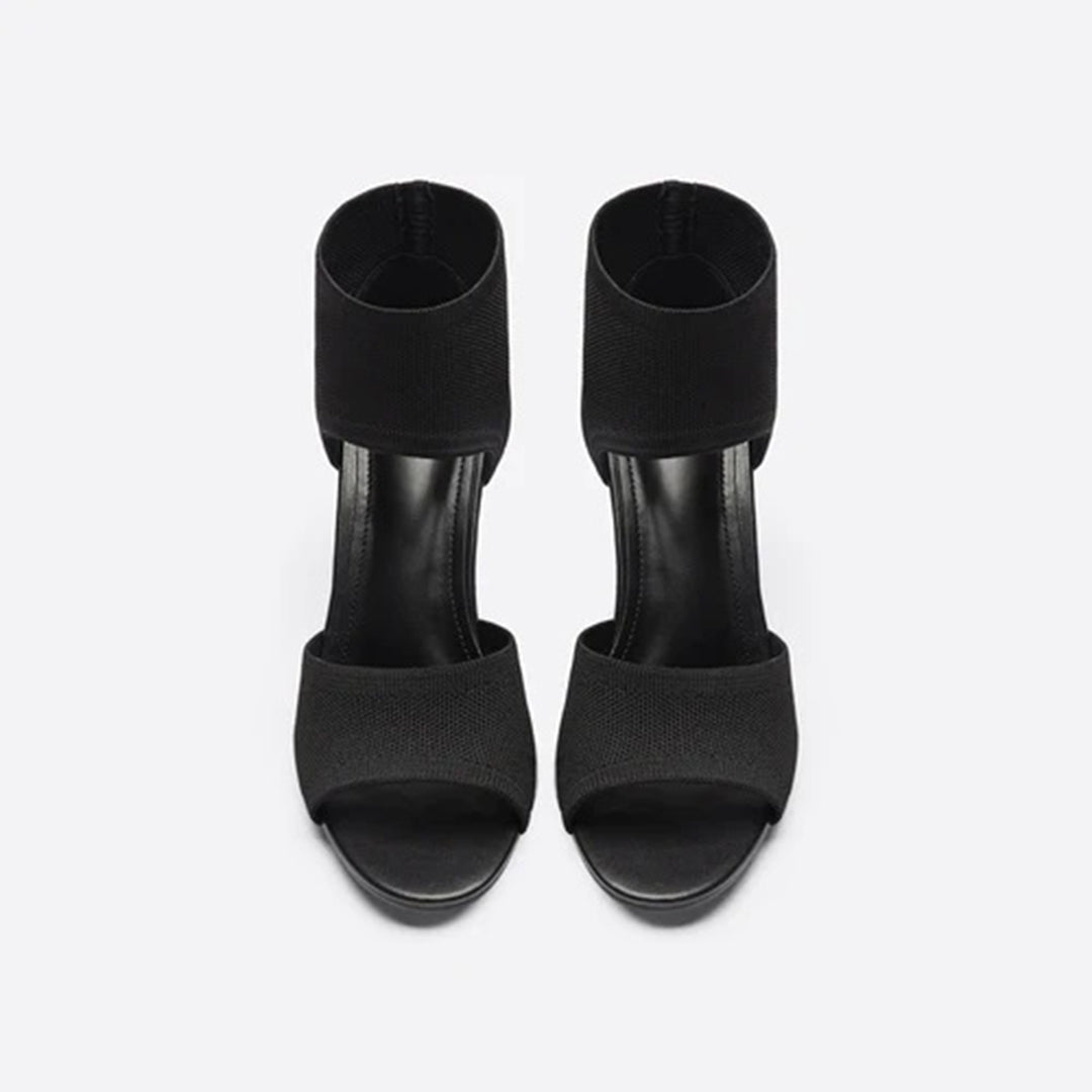 Zwarte dameshakken met open teen en enkelband, elegant design, perfect voor avondkleding en formele gelegenheden. Stijlvolle zwarte sandalen.