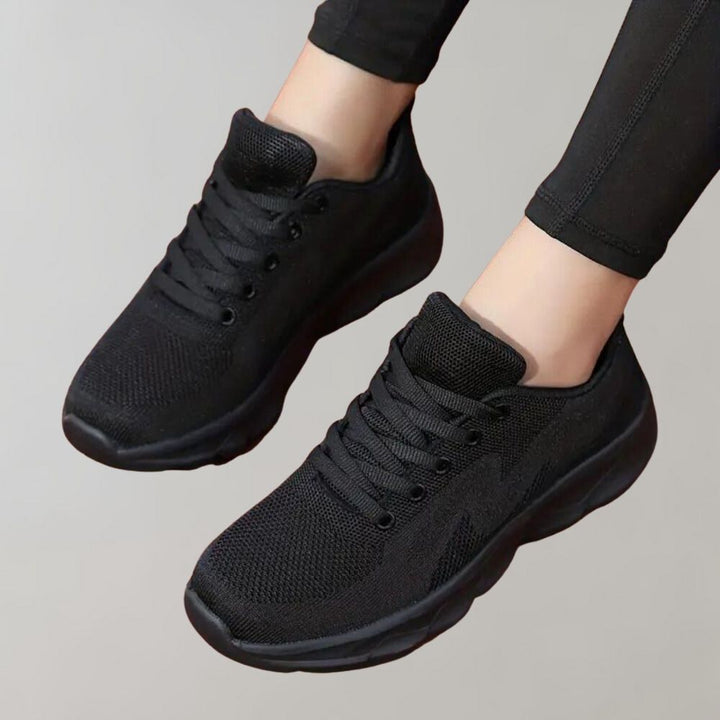 Zwarte dames sneakers, ademend mesh, lichtgewicht, comfortabele sportschoenen, casual stijl, geschikt voor dagelijks gebruik en sportactiviteiten.