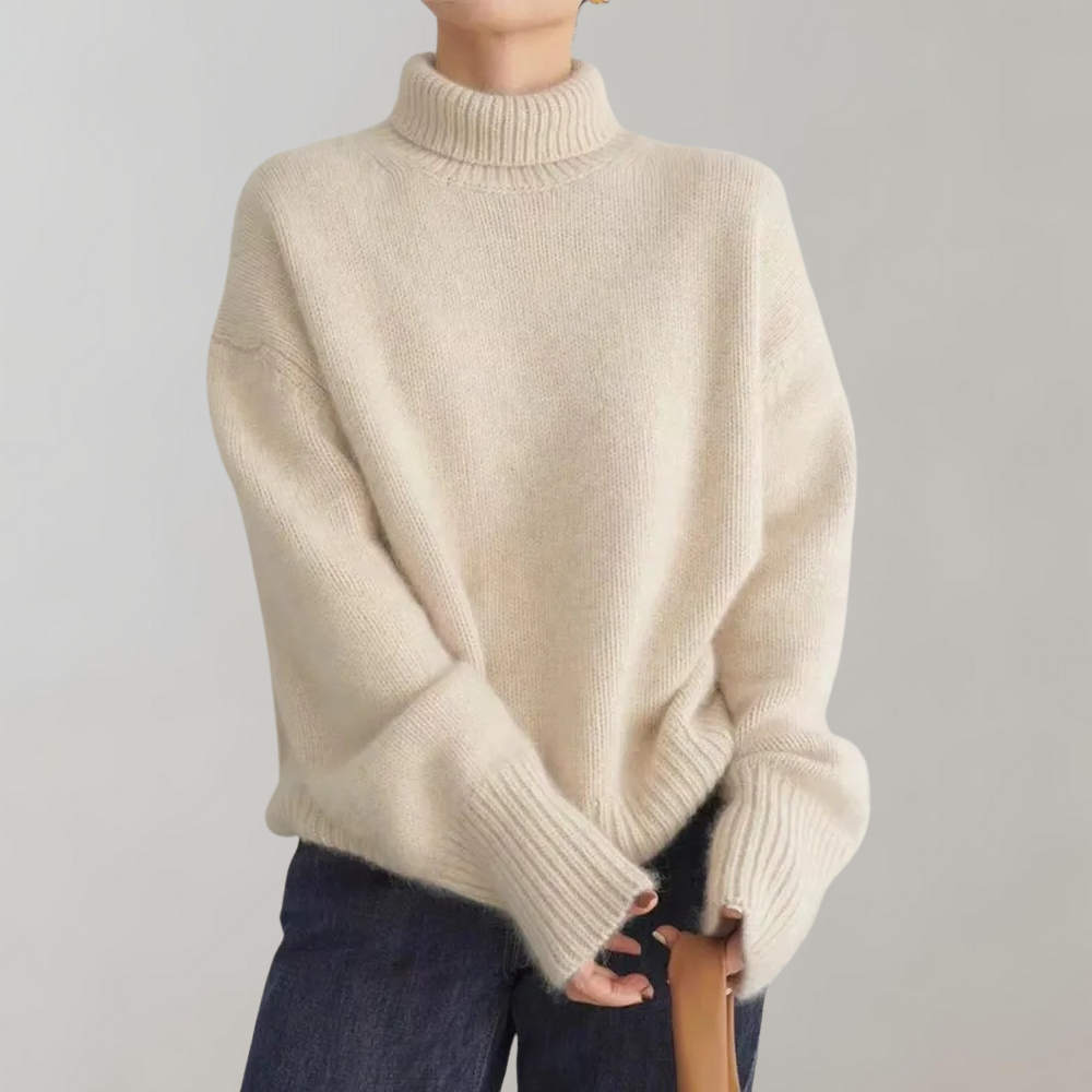 Beige oversized coltrui dames, gebreid, lange mouwen, casual stijl. Perfect voor herfst en winter. Comfortabele en modieuze dameskleding.