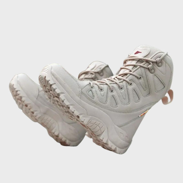 Beige wandelschoenen voor dames, hoge enkelsteun, robuuste zool, ademend materiaal, ideaal voor outdoor activiteiten en trekking.