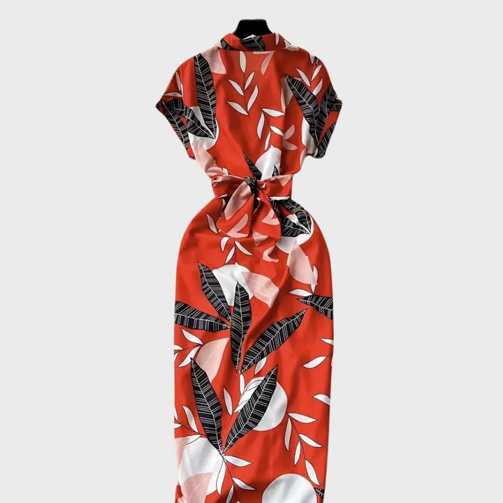 Rode damesjurk met korte mouwen, tropische bladerenprint en strikceintuur. Perfect voor zomer, casual en strandoutfits. Modieuze dameskleding.