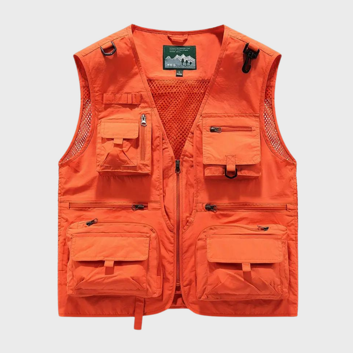 Oranje tactisch vest met meerdere zakken, ideaal voor outdooractiviteiten. Lichtgewicht en duurzaam ontwerp, perfect voor vissen en wandelen.
