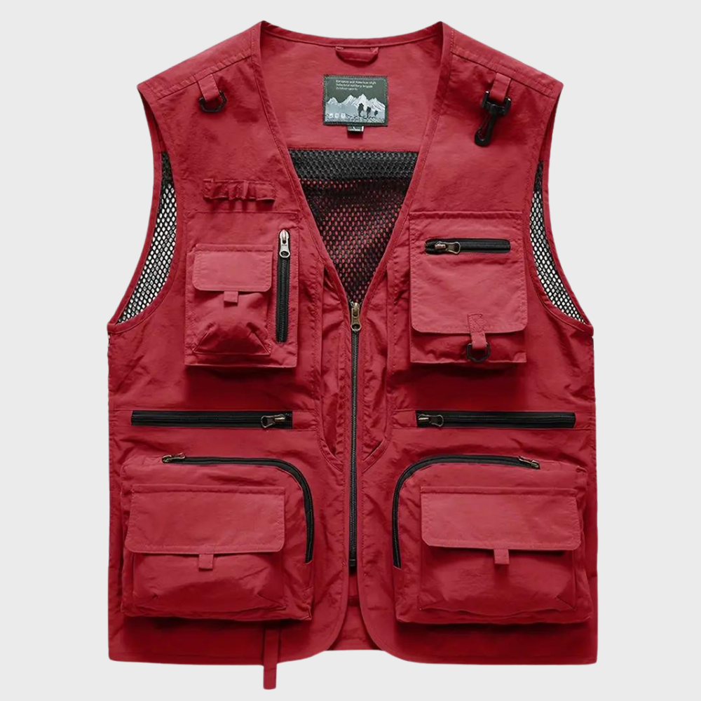 Rode tactische vest met meerdere zakken en ritssluiting, ideaal voor outdooractiviteiten. Gemaakt van duurzaam materiaal met ademende mesh-panelen.