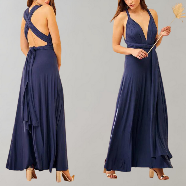 Donkerblauwe avondjurk met diepe V-hals en gekruiste rugbanden, vloerlengte, elegant ontwerp, perfect voor formele gelegenheden.