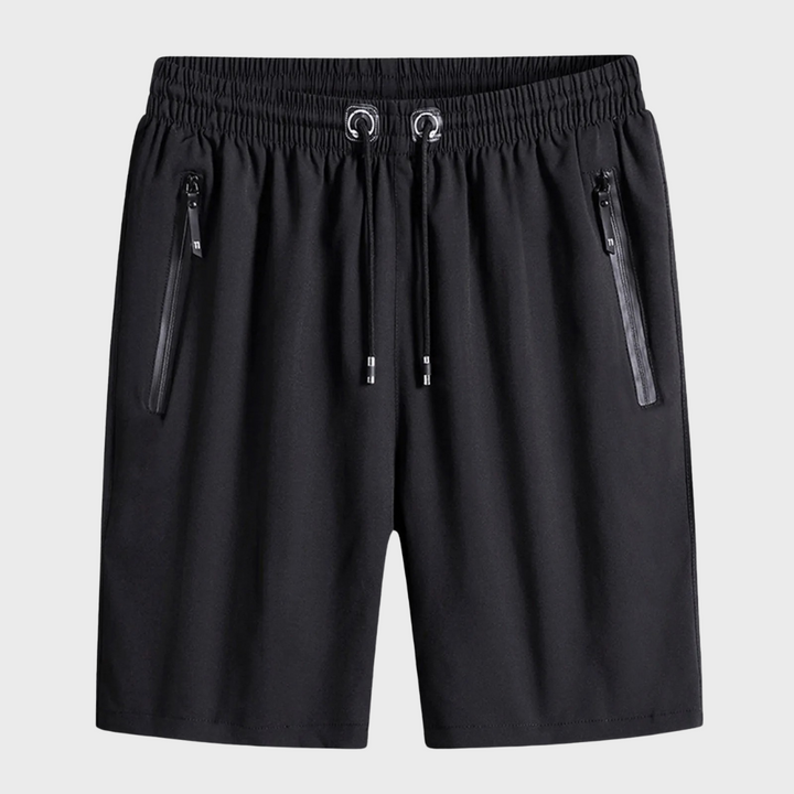 Zwarte sportshorts met elastische tailleband, trekkoord en ritszakken. Ideaal voor heren, comfortabel en stijlvol voor sport en vrije tijd.