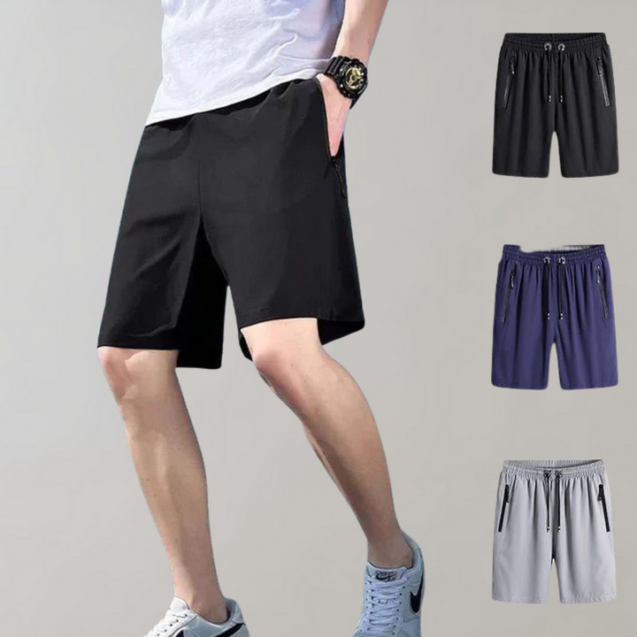 Man in sportieve zwarte korte broek, casual stijl, met drie kleurenopties: zwart, blauw, grijs. Perfect voor zomer, fitness en dagelijks gebruik.