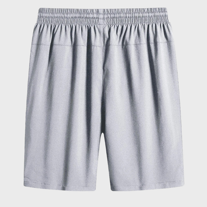 Grijze sportshorts voor heren met elastische tailleband, ademend materiaal, ideaal voor fitness en hardlopen. Comfortabele en stijlvolle sportkleding.
