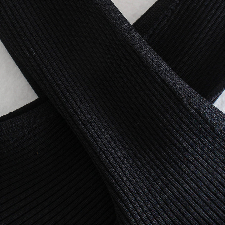 Zwarte geribbelde elastische band, close-up textuur, ideaal voor kleding en accessoires. Hoogwaardige stof, duurzaam en veelzijdig.