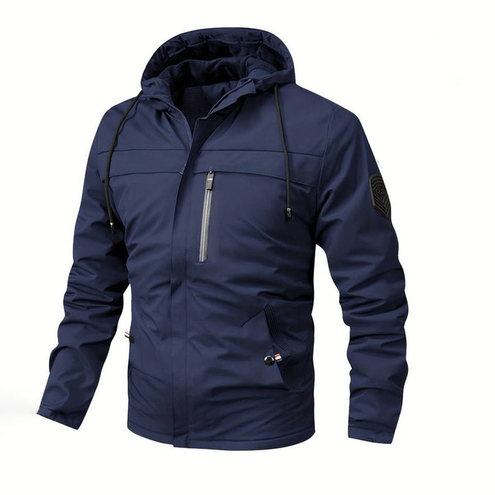 Donkerblauwe herenjas met capuchon, waterdicht en winddicht, ideaal voor outdoor activiteiten. Stijlvolle en functionele jas voor alle seizoenen.