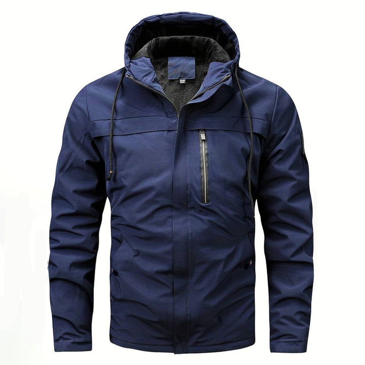 Donkerblauwe herenjas met capuchon, waterdicht en winddicht, ideaal voor outdoor activiteiten. Stijlvolle en functionele winterjas.