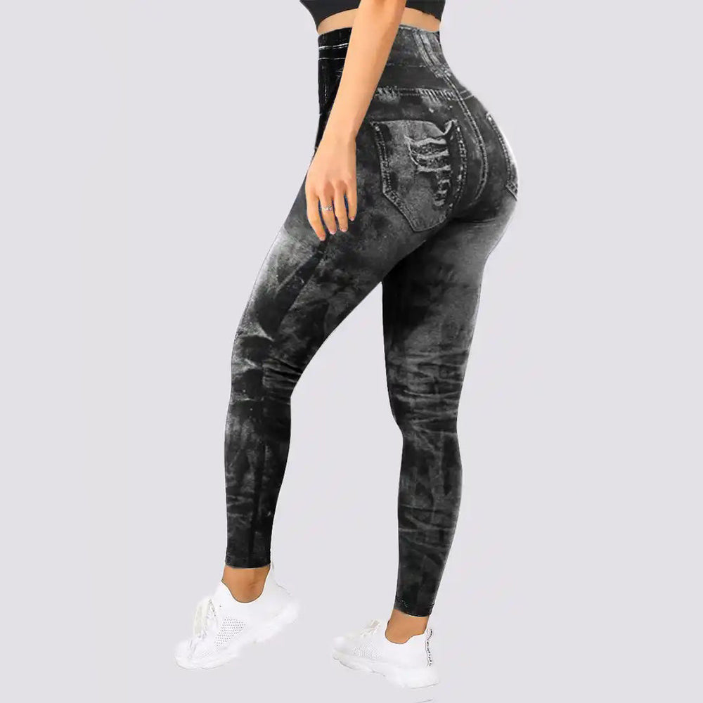 Grijze denim-look legging voor dames, hoge taille, comfortabele pasvorm, modieuze jeansprint, ideaal voor casual en sportieve outfits.