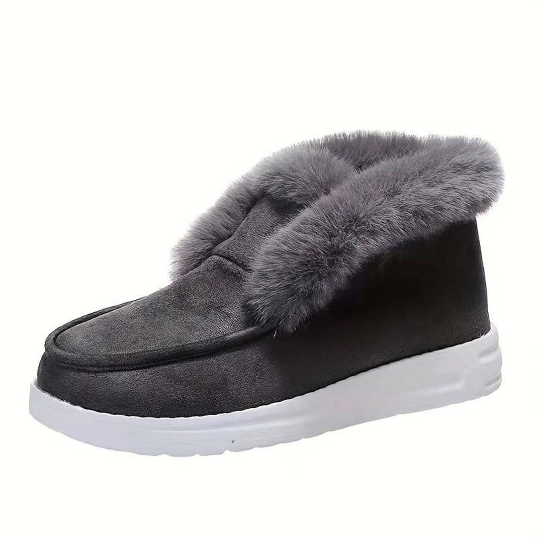 Grijze winterlaars met bontvoering, comfortabele witte zool, warme dameslaars, ideaal voor koude seizoenen, modieuze en functionele schoenen.