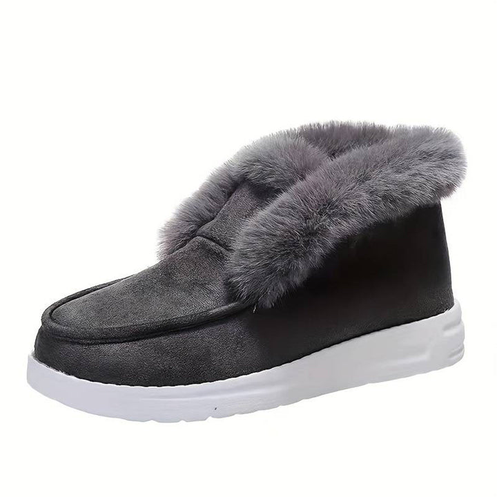 Grijze winterlaars met bontvoering, comfortabele witte zool, warme dameslaars, ideaal voor koude seizoenen, modieuze en functionele schoenen.