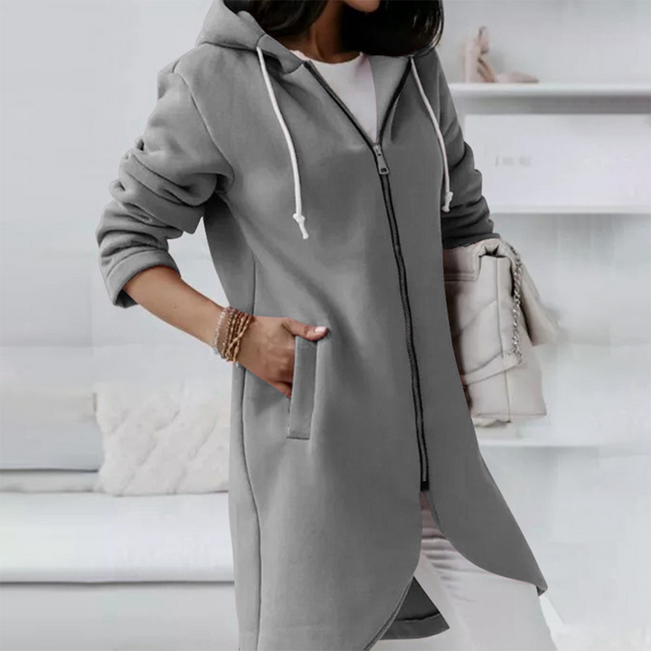Grijze dames hoodie met rits, capuchon en zakken, casual en comfortabel, ideaal voor dagelijks gebruik. Trendy mode voor herfst en winter.