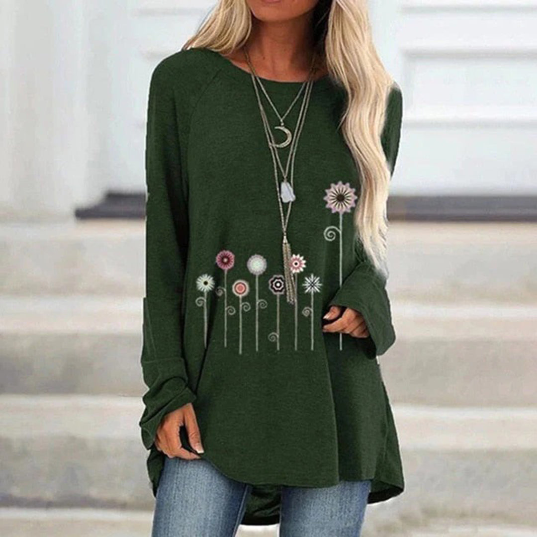 Groene damestrui met bloemenprint, lange mouwen en ronde hals. Perfect voor casual outfits. Comfortabele pasvorm, ideaal voor herfstmode.