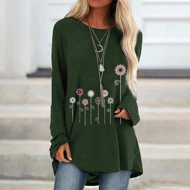 Groene damestrui met bloemenprint, lange mouwen en ronde hals. Perfect voor casual outfits. Comfortabele pasvorm, ideaal voor herfstmode.
