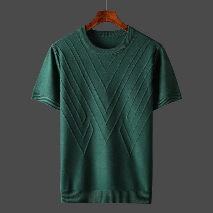 Groene gebreide trui met korte mouwen, geometrisch patroon, ronde hals, unisex design, perfect voor casual en stijlvolle outfits.