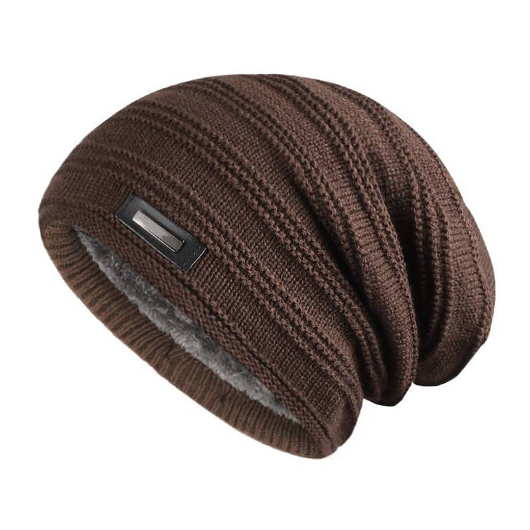 Bruine gebreide wintermuts met fleecevoering, unisex, ideaal voor koude dagen. Stijlvolle en warme beanie, perfect voor wintermode.