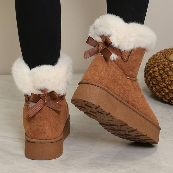 Lichtbruine suède laarzen met witte bontkraag en strikdetails, damesmode, winterlaarzen, warme voering, comfortabele zool, trendy schoeisel.
