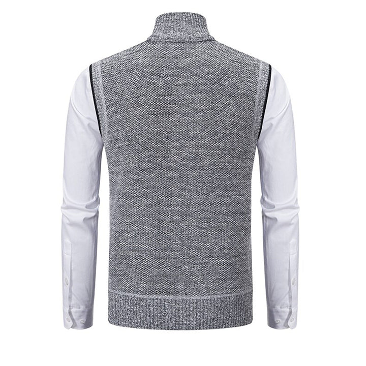 Grijze herenvest met hoge kraag, gebreid patroon en witte mouwen. Stijlvolle en moderne kleding voor casual en formele gelegenheden.