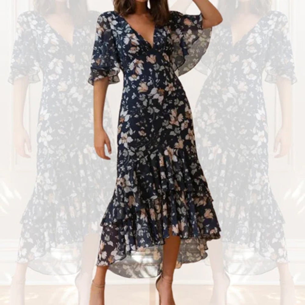 Donkerblauwe bloemenjurk met V-hals en asymmetrische zoom, ideaal voor zomerse gelegenheden. Elegante damesmode, trendy en stijlvol ontwerp.