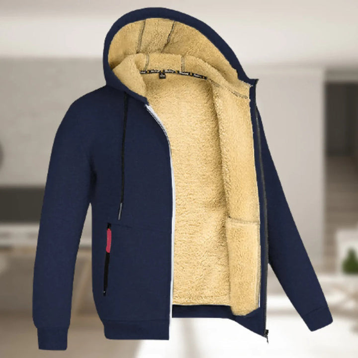 Marineblauwe hoodie met zachte fleecevoering, ritssluiting en capuchon. Perfect voor wintermode en casual comfort. Unisex kledingstuk.