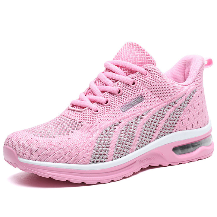 Roze dames sneaker met ademend mesh, comfortabele zool en vetersluiting. Perfect voor sport en casual outfits. Trendy en lichtgewicht ontwerp.