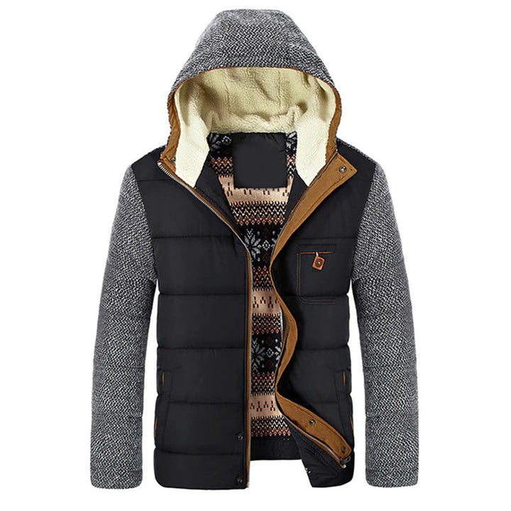 Zwart-grijze winterjas met capuchon, gewatteerd ontwerp, wollen mouwen, en etnisch patroon voering. Stijlvolle herenjas voor koude seizoenen.