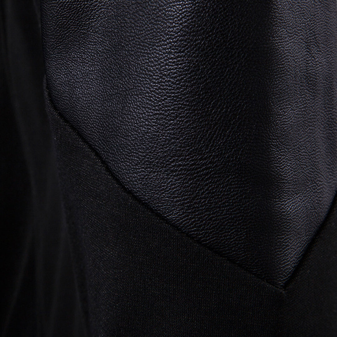 Zwart leren jas detail, close-up van textuur en materiaal. Hoogwaardige mode, duurzaam leer, stijlvolle kleding. Perfect voor herfst- en wintermode.