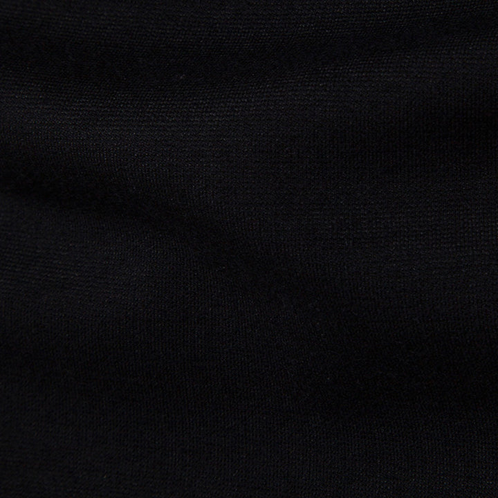 Zwarte katoenen stof close-up, textuur en weefsel zichtbaar. Ideaal voor kleding, naaiprojecten en interieurdecoratie. Hoogwaardige textielmaterialen.